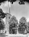 Overzicht van de zuidwestgevel met kerktoren - Utrecht - 20314317 - RCE -  Voormalige Hervormde Kerk: Overzicht van de zuidwestgevel met kerktoren (opmerking: Gefotgrafeerd voor de MIN Utrecht, bladzijde 232) 