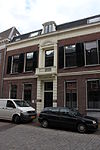 Pand met lijstgevel met middenpartij omtrent 1860