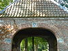 Hamtoren poortgebouw detail boog -  Hamtoren, gemetselde boog in het poortgebouw. Het poortgebouw is verbouwd in 1642. Sluitsteen en aanzetstenen goed zichtbaar in de boog. 