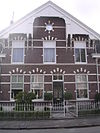 512649-utr-sw-6-085.JPG -  Woonhuis, onderdeel van een woonblok dat in zijn geheel een rijksmonument is (nummers 4,6,8). Utrechtsestraatweg 6, Woerden, Nederland. 