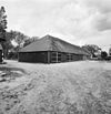 Overzicht achtergevel en linker zijgevel, houten wagenschuur - Borssele - 20352753 - RCE -  Boerderij Klein Monsterhoek: Overzicht achtergevel en linker zijgevel, houten wagenschuur (opmerking: Gefotografeerd voor Monumenten In Nederland Zeeland) 