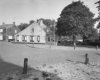 Exterieur overzicht boerderij, ligging vanaf de weg