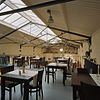 Interieur voormalige goederenloods - Goes - 20344629 - RCE -  Spoorbaantraject Van De Spoorwegremise In Goes Naar Oudelande: Interieur voormalige goederenloods 
