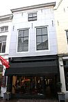 Huis met gecementeerde lijstgevel