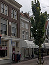 Huis met gecementeerde lijstgevel