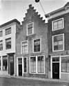 Huis met gepleisterde trapgevel