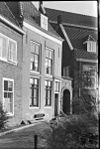 Huis met gepleisterde lijstgevel
