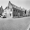 Overzicht voorgevel en linker zijgevel met trapgevel - Middelburg - 20352590 - RCE -  Trapgevel: Overzicht voorgevel en linker zijgevel met trapgevel (opmerking: Gefotografeerd voor Monumenten In Nederland Zeeland, bladzijde 173) 