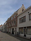 Middelburg Herenstraat25 -  Middelburg, Herenstraat 25 (center, right of the three brickstone houses)