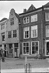 Huis met geverfde klokgevel