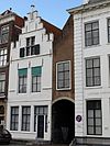 Damplein.29.Middelburg - House with archway at Damplein 29, Middelburg. Built 16th century. Their national-monument numbers are 28860 (house) and 28861 (archway).