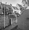 Huis met gecementeerde rechte gevel