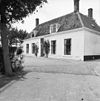 Voorgevel en koetshuis - Noordgouwe - 20169017 - RCE -  De Rozengaard: voorgevel en koetshuis 