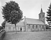 Overzicht noordoostgevel met voorgevel aangebouwde consistorie - Serooskerke (Schouwen) - 20352346 - RCE -  Nederlands Hervormde Kerk: Overzicht noordoostgevel met voorgevel aangebouwde consistorie (opmerking: Gefotografeerd voor Monumenten In Nederland Zeeland, bladzijde 219) 