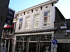 Huis met gepleisterde lijstgevel
