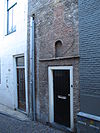 Poort in tuinmuur