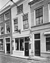 Huis met gepleisterde lijstgevel