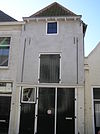 Pakhuis met gepleisterde gevel