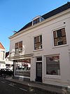 Zijgevel van het winkelhuis hoek Nieuwe Boogerdstraat- St.Domusstraat