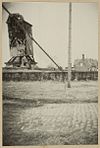 Molen met oorlogsschade tijdens uithalen roeden - Retranchement - 20327115 - RCE -  Molen van Retranchement: Molen met oorlogsschade tijdens uithalen roeden (opmerking: Bijschrift: bijl. v. schr. R.B. no 3437) 