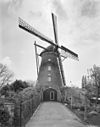 Overzicht windmolen, beltmolen - Biervliet - 20352928 - RCE -  De Harmonie: Overzicht windmolen, beltmolen (opmerking: Gefotografeerd voor Monumenten In Nederland Zeeland) 