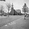 Overzicht zuidwestgevel met kerktoren - Stavenisse - 20352484 - RCE -  Nederlands Hervormde Kerk: Overzicht zuidwestgevel met kerktoren (opmerking: Gefotografeerd voor Monumenten In Nederland Zeeland, bladzijde 233) 