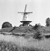 Overzicht windmolen, stellingmolen - Veere - 20352641 - RCE -  De Koe: Overzicht windmolen, stellingmolen (opmerking: Gefotografeerd voor Monumenten In Nederland Zeeland) 