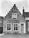 Huis met gecementeerde trapgevel