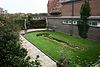 492789 Boulevard Evertsen bij 290 4 -  Tuin achter muur 