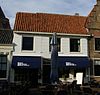 Dwarshuis met zadeldak tussen puntgevels