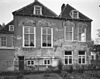 Gedeelte van de achtergevel, tijdens herstel van het pleisterwerk - Brielle - 20042772 - RCE -  Merulaweeshuis: Gedeelte van de achtergevel, tijdens herstel van het pleisterwerk 