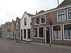 Huis met puntgevel met gewijzigde top
