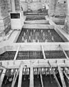 Interieur- de torenfundering wordt verstevigd door een gordel van voorgespannen beton - Brielle - 20042588 - RCE -  Grote kerk of Catharijnekerk: Interieur: de torenfundering wordt verstevigd door een gordel van voorgespannen beton 