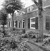 Womingen gezien vanaf het hoofdgebouw - Delft - 20050504 - RCE -  Hofje Elisabeth v. Pauw: womingen gezien vanaf het hoofdgebouw 