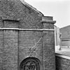 Detail van de gevel van de voormalige synagoge te Delft met een rond venster met Davidster - Delft - 20050088 - RCE -  Voormalige synagoge: Detail van de gevel van de voormalige synagoge te Delft met een rond venster met Davidster 