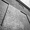 Glimmende laag op voorgevel - 's-Gravenhage - 20087774 - RCE -  Hofje van Nieuwkoop: glimmende laag op voorgevel 
