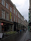Winkel-woonhuis en winkelinterieur in eclectische stijl