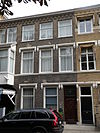 Voornaam woonhuis in bakstenen neo-gotiek naar Engelse trant