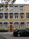 Voornaam woonhuis in bakstenen neo-gotiek naar Engelse trant