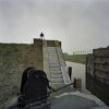 Stenen trap langs dijklichaam