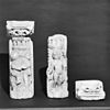Twee colonnetten met putti en kapitelen, afkomstig van de voorgevel - Dordrecht - 20062921 - RCE -  Huis De Rozijnkorf: Twee colonnetten met putti en kapitelen, afkomstig van de voorgevel (opmerking: Collectie Bouwfragmenten RACM. Inventarisnr. BF-C-29) 
