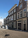 Dordrecht Wijnstraat56 -  Dordrecht, Wijnstraat 56 (center, brickstone with the white top) 