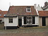 Dwarshuisje onder zadeldak