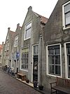 Pand met gepleisterde puntgevel