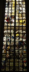 Glass 7 - Phillips II - Mary Tudor -  Glas 7 in Janskerk Gouda, Inwijding van de tempel door Salomo, Dirck Crabeth, 1557.