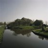 Overzicht boerderij met omgeving