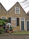 Pandje met puntgevel onder rollaag