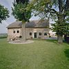 Overzicht voorgevel, na restauratie - Maasland - 20341702 - RCE -  Boerderijen/ Krukhuis: Overzicht voorgevel, na restauratie 