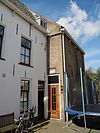 Langwerpig huis onder schilddak