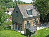 Bakhuis. Kattendijk 163 -  Het bakhuis hoort bij de boerderij Kattendijk 163, Gouderak. Het bakhuis heeft een pannen zadeldak, puntgevels en vensters met oude kozijnen en luiken.  House with baking oven 